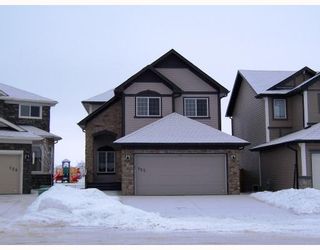 Photo 1: 125 CHANNELSIDE Cove SW: Airdrie Residential Detached Single Family for sale : MLS®# C3407858