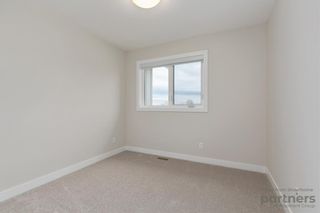 Photo 30: 948 Crestridge Common SW in Calgary: Crestmont Row/Townhouse for sale : MLS®# A2012906