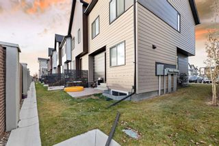 Photo 4: 602 Redstone Crescent NE in Calgary: Redstone Row/Townhouse for sale : MLS®# A2092515
