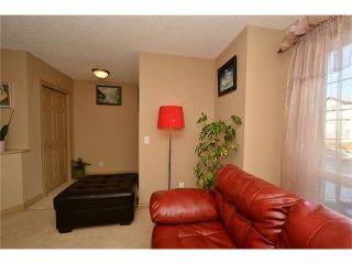 Photo 6: 202 ARBOUR MEADOWS Close NW in Calgary: Arbour Lake House for sale : MLS®# C4048885