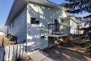 Photo 1: 553 Macewan Drive NW in Calgary: MacEwan Glen Semi Detached (Half Duplex) for sale : MLS®# A2019903