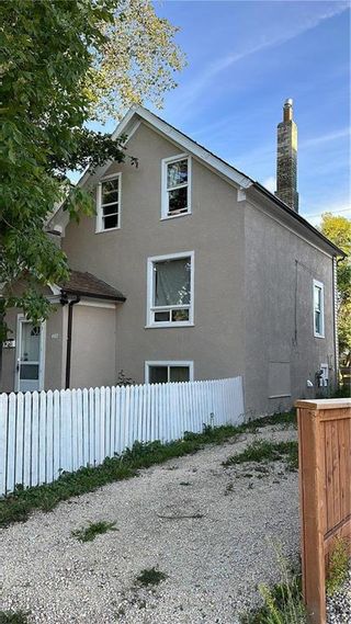 Photo 1: 402 Redwood Avenue in Winnipeg: North End Residential for sale (4A)  : MLS®# 202330079