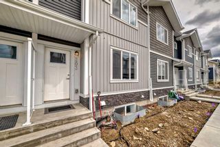 Photo 2: 203 137 Red Embers Link NE in Calgary: Redstone Row/Townhouse for sale : MLS®# A2124972