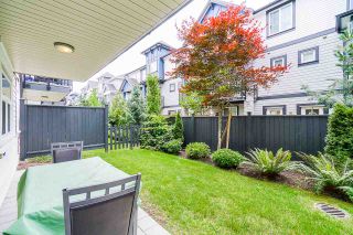 Photo 17: 27 7665 209 Street in Langley: Willoughby Heights Townhouse for sale in "Archstone" : MLS®# R2393037
