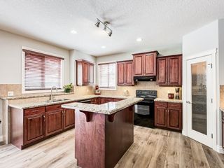 Photo 6: 26 TUSSLEWOOD View NW in Calgary: Tuscany Detached for sale : MLS®# C4296566