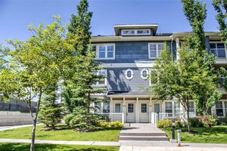 Photo 1: 50 Auburn Bay Common SE in Calgary: Auburn Bay Row/Townhouse for sale : MLS®# A1128928