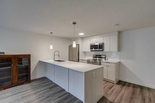 Photo 4: 127 Panatella Square NW in Calgary: Panorama Hills Row/Townhouse for sale : MLS®# A2127980