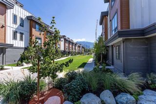 Photo 3: 101 - 39771 GOVERNMENT Road in Squamish: Northyards Multifamily for sale in "The Breeze" : MLS®# R2773688