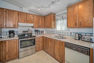 Photo 12: 102 2303 CRANLEY Drive in Surrey: King George Corridor Manufactured Home for sale in "SUNNYSIDE ESTATES" (South Surrey White Rock)  : MLS®# R2618060