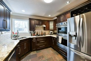 Photo 12: 180 Signature Close SW in Calgary: Signal Hill Detached for sale : MLS®# A1173109