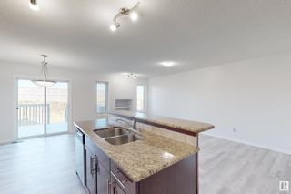 Photo 6: 7301 ARMOUR Crescent in Edmonton: Zone 56 House Half Duplex for sale : MLS®# E4314626