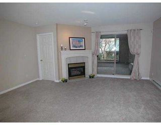 Photo 3: 301 MAUDE Road in Port Moody: North Shore Pt Moody Condo for sale in "HERITAGE GRAND" : MLS®# V633181