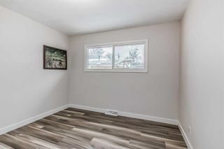 Photo 16: 77 Fredson Drive SE in Calgary: Fairview Detached for sale : MLS®# A2102539