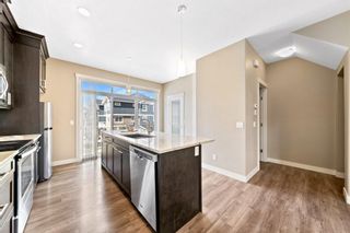 Photo 12: 527 Evanston Manor NW in Calgary: Evanston Row/Townhouse for sale : MLS®# A1195059