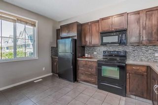 Photo 13: 2004 125 Panatella Way NW in Calgary: Panorama Hills Row/Townhouse for sale : MLS®# A2056398