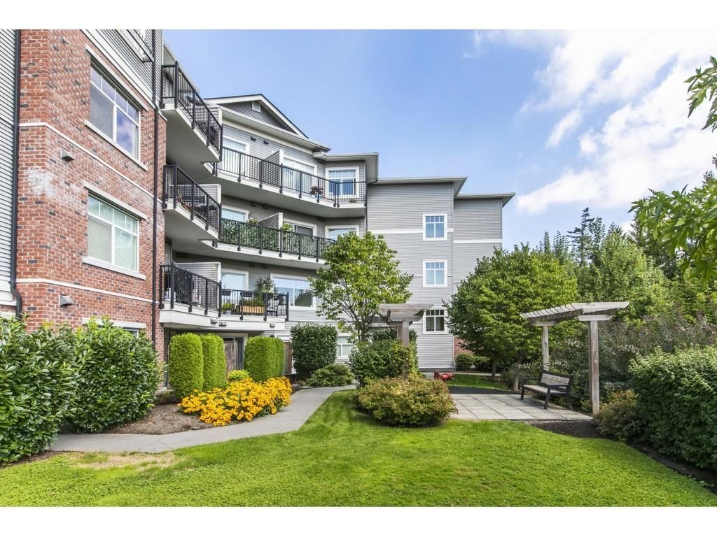 Main Photo: 208 19530 65 Avenue in Surrey: Clayton Condo for sale in "Willow Grand" (Cloverdale)  : MLS®# R2613255