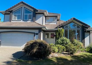 Photo 1: 7408 146 Street in Surrey: East Newton House for sale : MLS®# R2718096