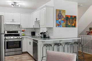 Photo 9: 104 Mt Aberdeen Manor SE in Calgary: McKenzie Lake Row/Townhouse for sale : MLS®# A2057745