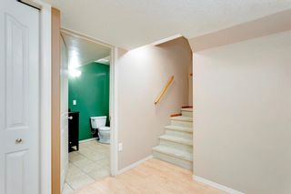 Photo 32: 30 Cougarstone Park SW in Calgary: Cougar Ridge Detached for sale : MLS®# A2000449