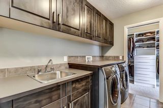 Photo 27: 141 TREMBLANT Heights SW in Calgary: Springbank Hill House for sale : MLS®# C4175148