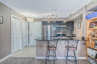 Photo 5: 2401 403 Mackenzie Way SW: Airdrie Apartment for sale : MLS®# A2024929