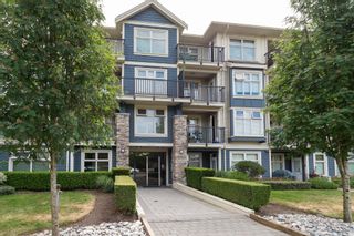 Photo 1: 206 8084 120A Street in Surrey: Queen Mary Park Surrey Condo for sale in "THE ECLIPSE" : MLS®# R2069146