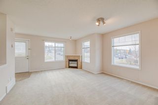 Photo 7: 90 Panamount Drive NW in Calgary: Panorama Hills Row/Townhouse for sale : MLS®# A1207583