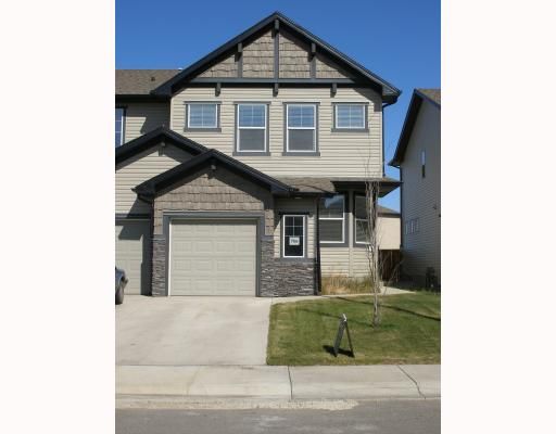 Main Photo: 766 LUXSTONE Gate SW: Airdrie Residential Attached for sale : MLS®# C3394347