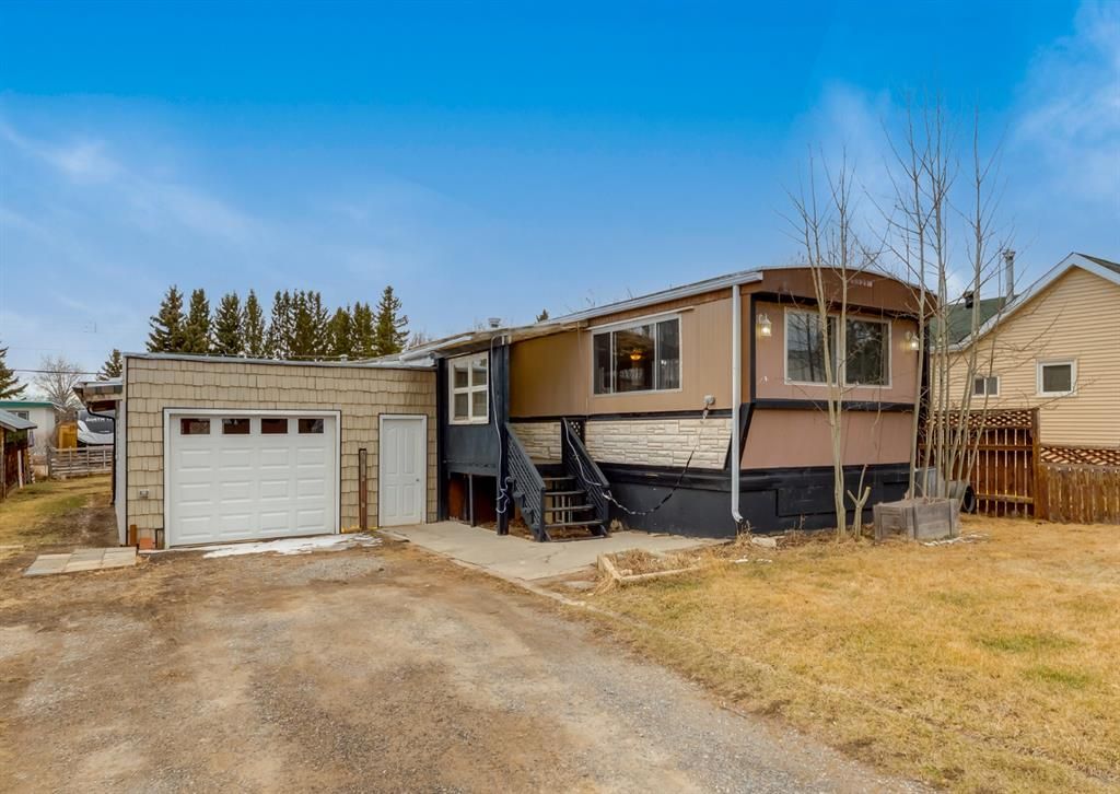 Main Photo: 209 Edgar Avenue NW: Turner Valley Detached for sale : MLS®# A1244972