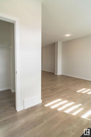 Photo 4: 2135 MAPLE Road in Edmonton: Zone 30 House Half Duplex for sale : MLS®# E4380184