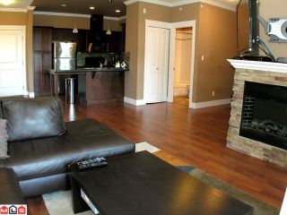 Photo 3: 408 33338 MAYFAIR Avenue in Abbotsford: Central Abbotsford Condo for sale in "The Sterling" : MLS®# F1100570