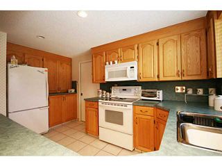 Photo 8: 240 LAKE MORAINE Place SE in CALGARY: Lk Bonavista Estates Residential Detached Single Family for sale (Calgary)  : MLS®# C3555049