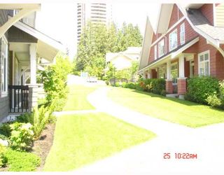 Photo 3: 57 6878 SOUTHPOINT Drive in Burnaby: South Slope Townhouse for sale in "CORTINA" (Burnaby South)  : MLS®# V768556