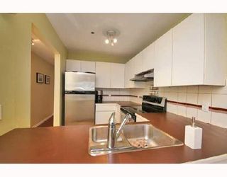 Photo 4: 107 953 W 8TH Avenue in Vancouver: Fairview VW Townhouse for sale in "THE SOUTHPORT" (Vancouver West)  : MLS®# V676314