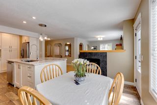 Photo 17: 107 Strathlea Place SW in Calgary: Strathcona Park Detached for sale : MLS®# A2052090