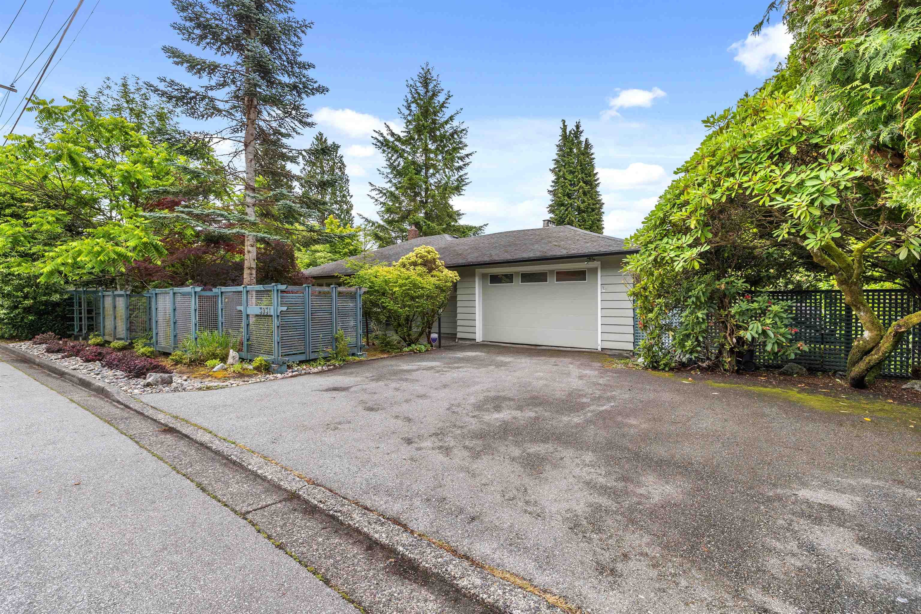Main Photo: 3931 SUNNYCREST Drive in North Vancouver: Forest Hills NV House for sale : MLS®# R2791443