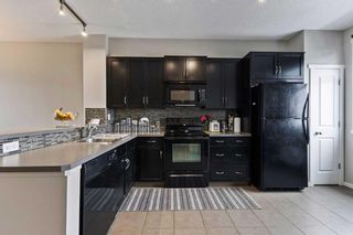 Photo 12: 92 Evansview Gardens NW in Calgary: Evanston Row/Townhouse for sale : MLS®# A2128589