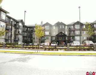 Photo 1: 403 2581 LANGDON ST in Abbotsford: Abbotsford West Condo for sale in "Cobblestone" : MLS®# F2612787