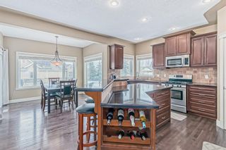 Photo 13: 66 COUGARSTONE Crescent SW in Calgary: Cougar Ridge Detached for sale : MLS®# A2020530