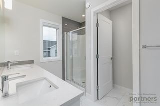 Photo 15: 948 Crestridge Common SW in Calgary: Crestmont Row/Townhouse for sale : MLS®# A2012906