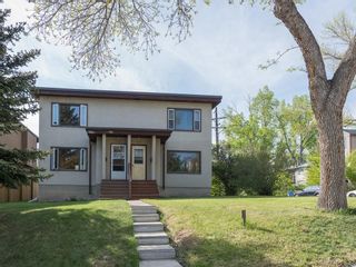Photo 2: 921 36A Street NW in Calgary: Parkdale House for sale : MLS®# C4118357