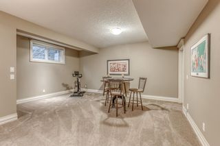 Photo 34: 11 Elmont Place SW in Calgary: Springbank Hill Semi Detached (Half Duplex) for sale : MLS®# A1243985