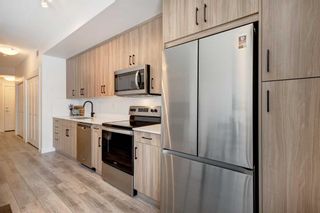 Photo 8: 322 400 Auburn Meadows Common SE in Calgary: Auburn Bay Apartment for sale : MLS®# A2125110
