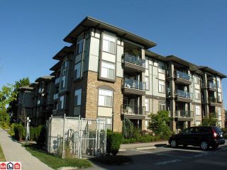 Photo 1: 408 33338 MAYFAIR Avenue in Abbotsford: Central Abbotsford Condo for sale in "The Sterling" : MLS®# F1100570