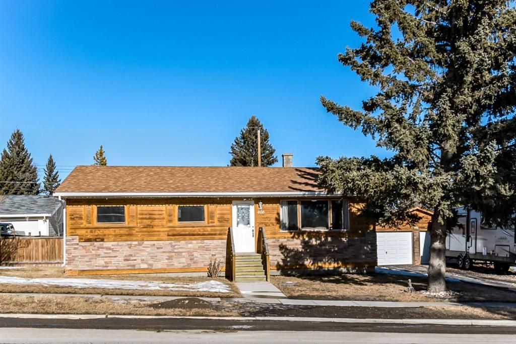 Main Photo: 406 Sunset Boulevard NW: Turner Valley Detached for sale : MLS®# A1178094