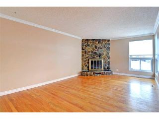 Photo 10: 6415 LONGMOOR Way SW in Calgary: Lakeview House for sale : MLS®# C4102401