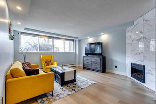 Photo 2: 102 1530 15 Avenue SW in Calgary: Sunalta Apartment for sale : MLS®# A2122169