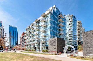 Photo 1: 601 118 Waterfront Court SW in Calgary: Chinatown Apartment for sale : MLS®# A2123695