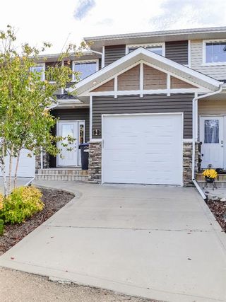 Photo 1: #2 5301 Windward Place Place: Sylvan Lake Row/Townhouse for sale : MLS®# A1146855