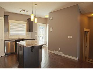 Photo 6: 452 Rainbow Falls Drive: Chestermere Townhouse for sale : MLS®# C3579282